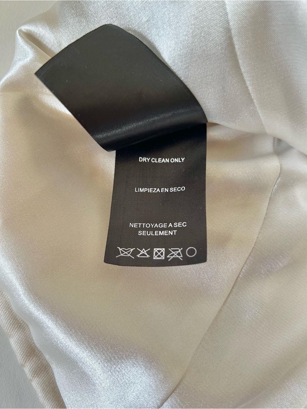 bebe Cream Strapless Satin Top with Black Brand Tag - Picture 10 of 10